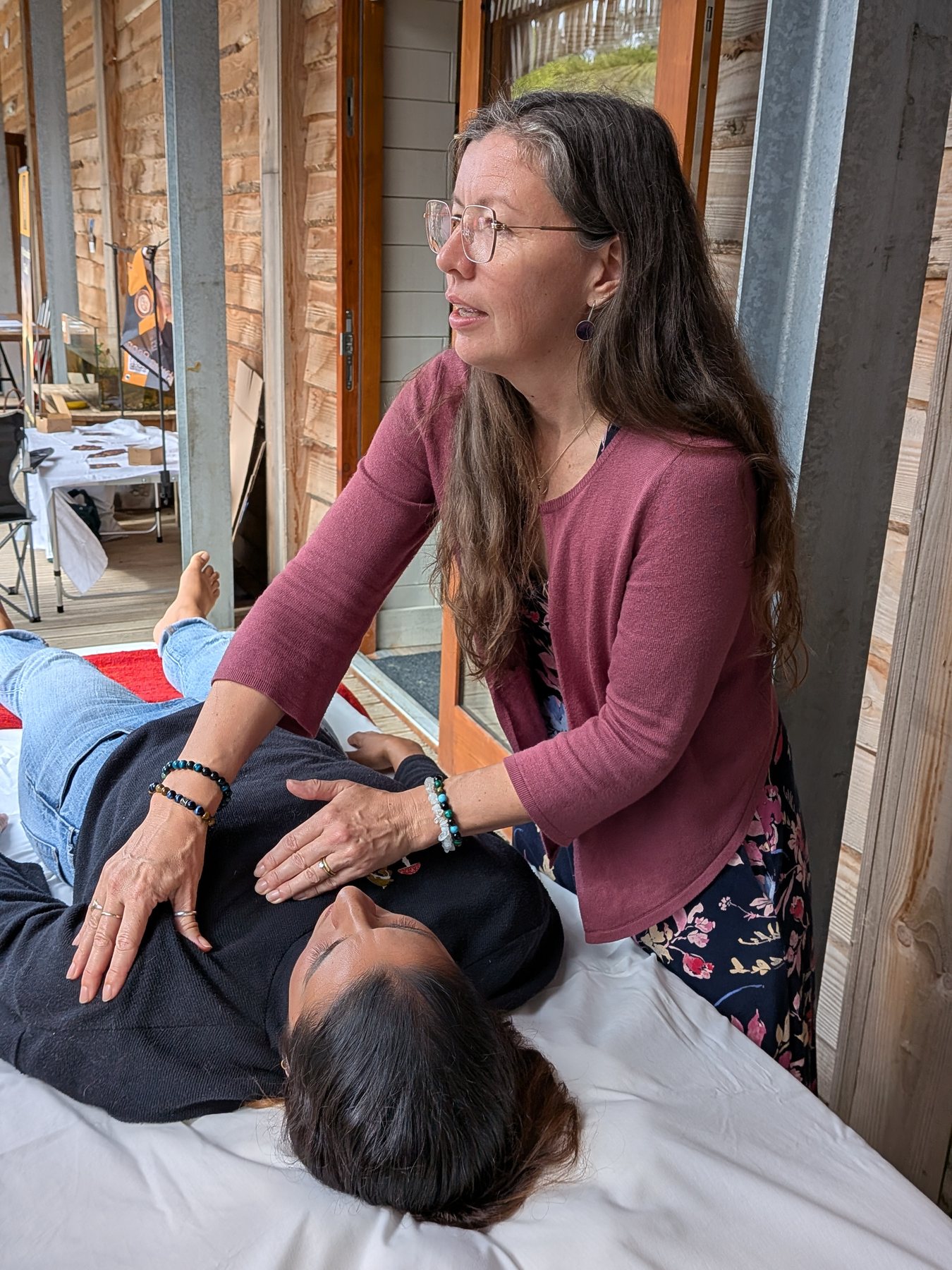 Julianne Fraser giving a hands-on bodywork session at Heligan